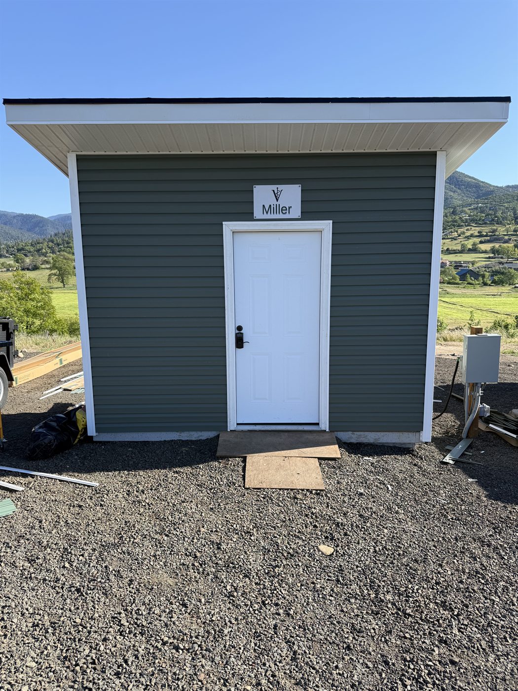 Donor sign reading Miller on the new clinic outbuilding